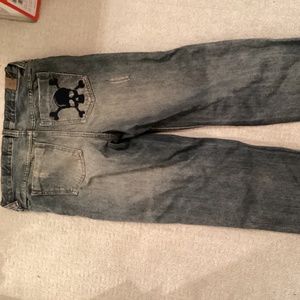 Embroidered skull baggy jeans